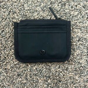 black lululemon true identity card case